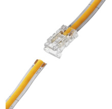 Conector cu clemă din plastic transparent pentru benzi LED COB pentru îmbinarea a două secțiuni galbene de bandă.
