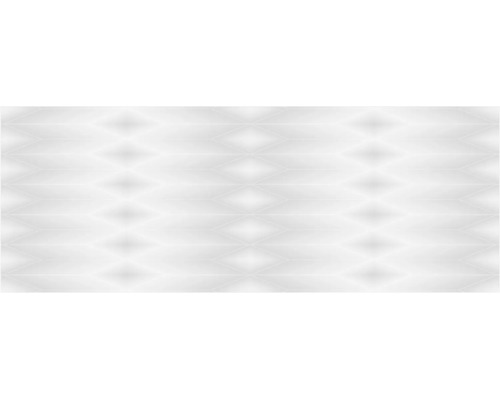 Faianță structurată cu model geometric tridimensional în formă de romb.