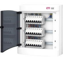 Tablou electric mic ETI cu trei rânduri, întrerupătoare automate și o ușă transparentă deschisă. Logo ETI. Marcaj CE.