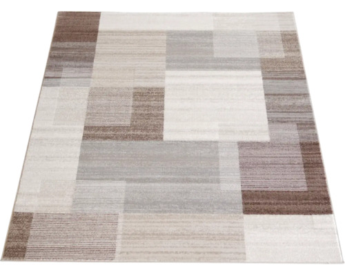 Covor cu fir scurt cu model geometric patchwork în nuanțe de bej, gri și maro, cu diferite structuri și dungi.