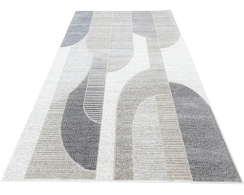 Covor cu model geometric abstract compus din curbe și linii.