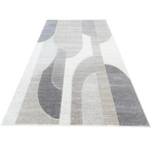 Covor cu model geometric abstract compus din curbe și linii.