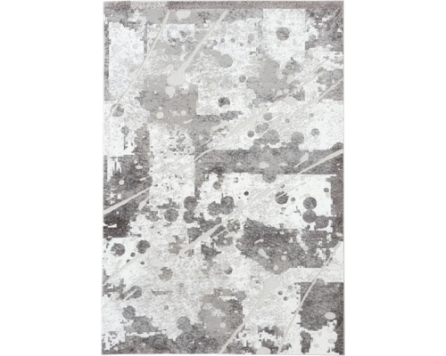 Covor modern cu model abstract format din puncte, pete și linii diagonale în nuanțe de gri și alb.