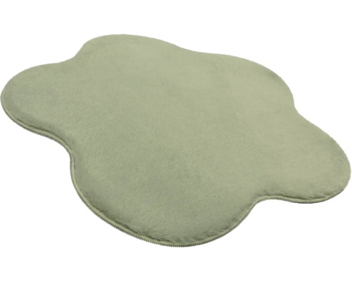 Covor moale din blană artificială verde deschis în formă de nor neregulată.