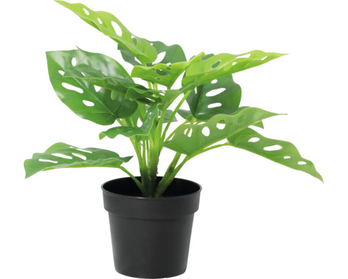 Plantă artificială Monstera în ghiveci negru.