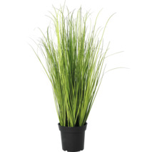 Iarbă ornamentală artificială în ghiveci de plastic negru.