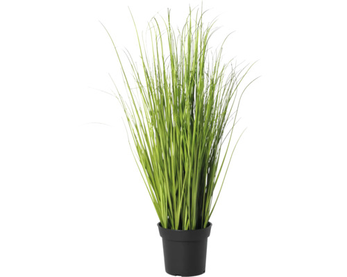 Plantă de iarbă artificială într-un ghiveci negru.