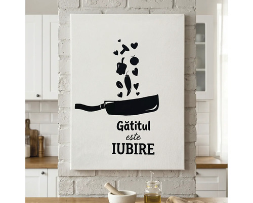 Tablou pe pânză pentru bucătărie cu o ilustrație a unei tigăi, ingrediente care cad și textul Gătitul este IUBIRE.