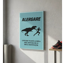 Tablou motivațional pe pânză cu textul Alergare și silueta unui dinozaur care urmărește un alergător.