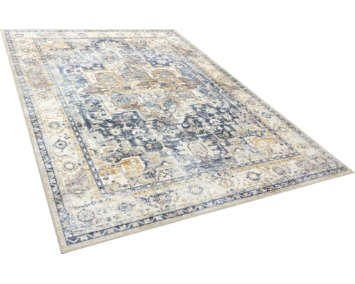 Covor dreptunghiular cu model vintage oriental, țesut, cu fir scurt, în nuanțe de albastru și bej.