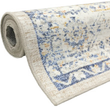 Covor rulat cu model oriental în stil vintage, cu accente albastre și aurii