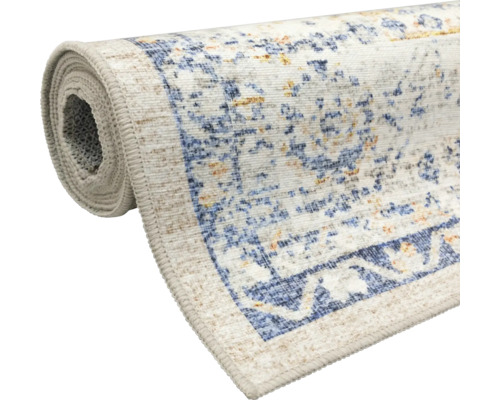 Covor rulat cu model oriental în stil vintage, cu accente albastre și aurii