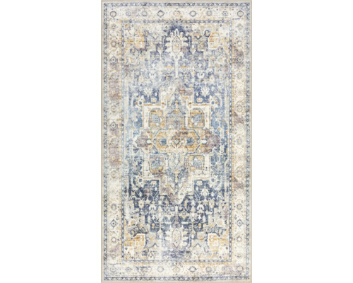 Covor dreptunghiular cu model oriental vintage în albastru și bej, medalion central și bordură ornamentală.