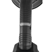 Vedere de aproape a unui mâner ergonomic striat al unei unelte din plastic.