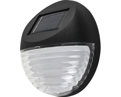 Aplică solară de exterior rotundă cu panou solar integrat și difuzor translucid striat.