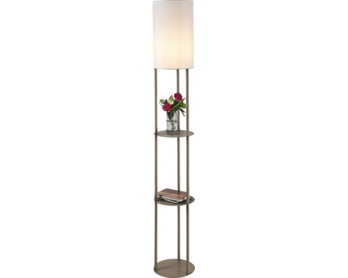 Lampadar tip trepied din metal de culoarea șampaniei cu două rafturi rotunde și un abajur cilindric alb din material textil.
