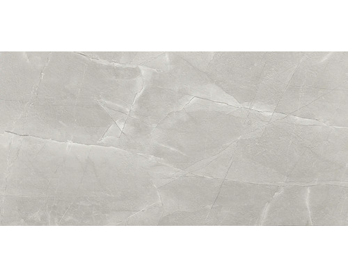 Placă ceramică gri cu aspect de piatră, nervuri fine și structură naturală a suprafeței.