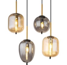 Pendul cu patru surse de lumina si abajururi din sticla cu forme si finisaje diferite, montate pe dulii metalice aurii