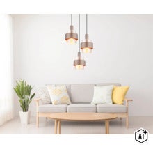 Lampă suspendată modernă cu trei surse de lumină deasupra unei canapele într-un living luminos cu măsuță de cafea și plantă. (Image AI modified or generated)
