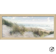 Tablou de perete cu motiv de plajă, dune și mare, înrămat într-o ramă de lemn în format peisaj (Image AI modified or generated)