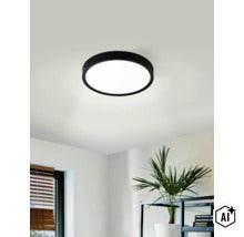 Plafonieră LED rotundă modernă cu design plat și suprafață mată montată într-o cameră de zi. (Image AI modified or generated)