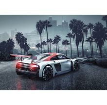 Mașină sport Audi în fața orizontului orașului Los Angeles cu palmieri