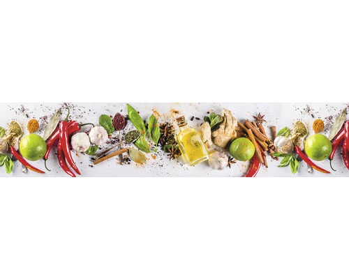 Aranjament de diverse condimente și ingrediente, cum ar fi ardei iute, usturoi, lime și ulei.