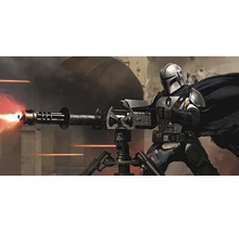 Un Mandalorian cu o armă grea pe un trepied.