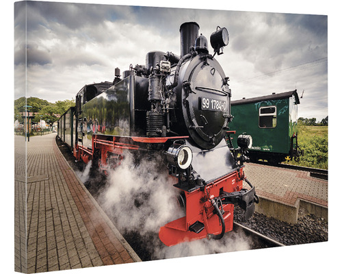 Imagine pe pânză a unei locomotive cu aburi într-o gară