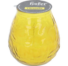 Lumânare parfumată cu citronella în recipient de sticlă galbenă