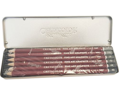 Set de creioane într-o cutie metalică