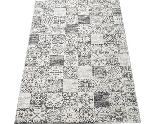 Covor cu model geometric patchwork
