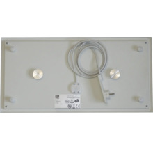 Partea din spate a unui panou infraroșu cu cablu de conectare și accesorii de montaj