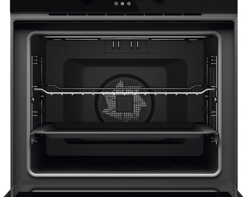 Vedere interioară a unui cuptor gol cu nivele de inserție și ventilator