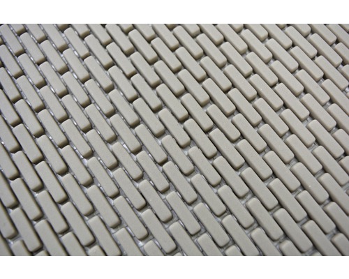 Prim-plan cu o covorașă de duș cu model dreptunghiular