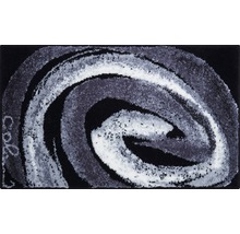 Covor cu model abstract în formă de vârtej