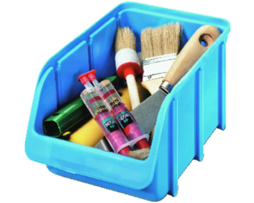 Cutie de depozitare albastră umplută cu unelte