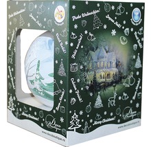 Glob decorat de Crăciun într-o cutie de cadou cu motive de Crăciun