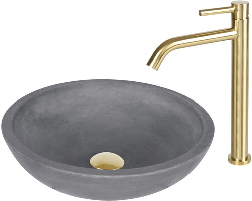 Lavoar gri din beton, montat pe blat, cu robinet auriu