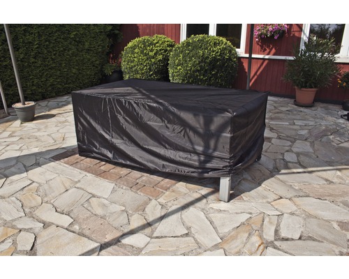 Husă de protecție dreptunghiulară pentru masă de grădină pe o terasă