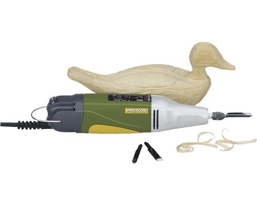 Daltă electrică Proxxon Micromot MSG 80W max. 10000 r/min, accesorii incluse Sigla Proxxon. O mașină de prelucrare a lemnului cu o bucată de lemn sculptată în formă de rață și așchii de lemn.