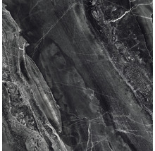 Prim-plan cu o placă de marmură închisă la culoare cu granulație