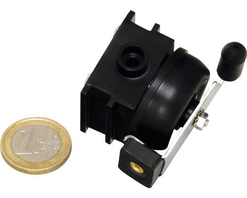 Comutator pentru sisteme de irigare, lângă o monedă euro