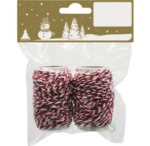 Două role de bandă decorativă roșu-alb într-un ambalaj