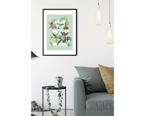 Poster înrămat Cartea Junglei cu citatul ''Keep the wild in you'' ca decor în camera de zi