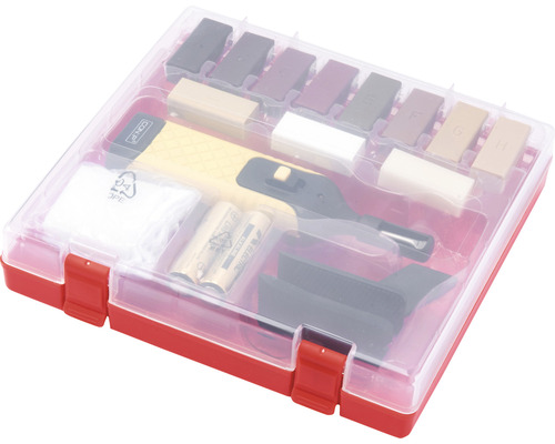 Set de reparații pentru mobilă într-o cutie roșie cu diverse instrumente de reparații