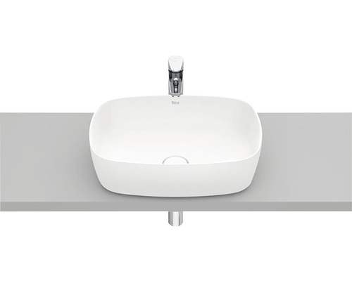 Lavoar de blat din ceramică sanitară cu baterie pe un raft