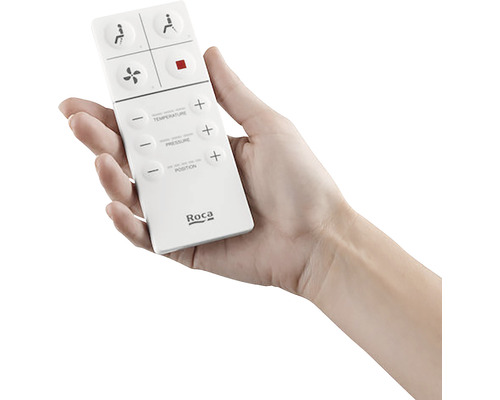 Telecomandă Roca pentru toalete cu duș ținută în mână.