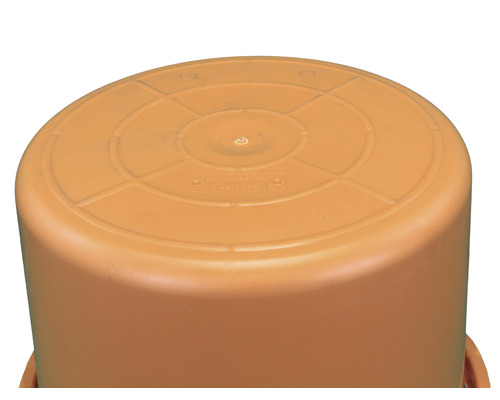 Partea inferioară a unei găleți de plastic cu cercuri concentrice