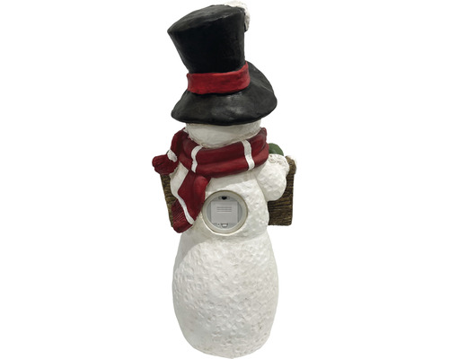 Vedere din spate a unei figurine de om de zăpadă cu pălărie și fular